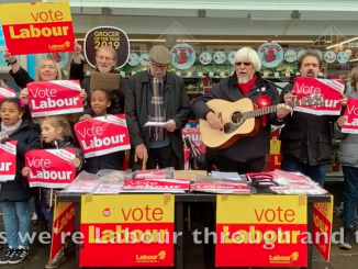 Singing "We're all voting Labour"