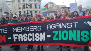 Unite members against racism and zionism